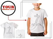 a young boy wearing a birthday shirt and a t - shirt with the number seven