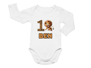 a white t - shirt with a picture of a lion on it