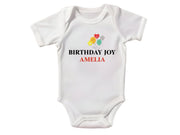 a white bodysuit with the words birthday joy on it