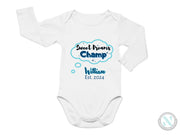 a baby bodysuit with the words sweet dreams champ on it