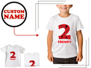 a young boy wearing a t - shirt with the number two printed on it