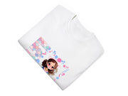a white t - shirt with a girl's face on it