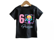 a black shirt with the number six on it