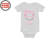 a white bodysuit with short sleeves on a white background