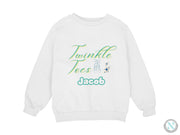 a white sweatshirt with the words'twinkle toes'printed on it