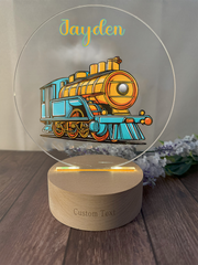 a glass plaque with a train on it