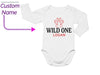 a long sleeved bodysuit with the words wild one on it