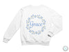 a white sweatshirt with the word grace printed on it