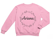 a pink sweatshirt with the name ariana printed on it